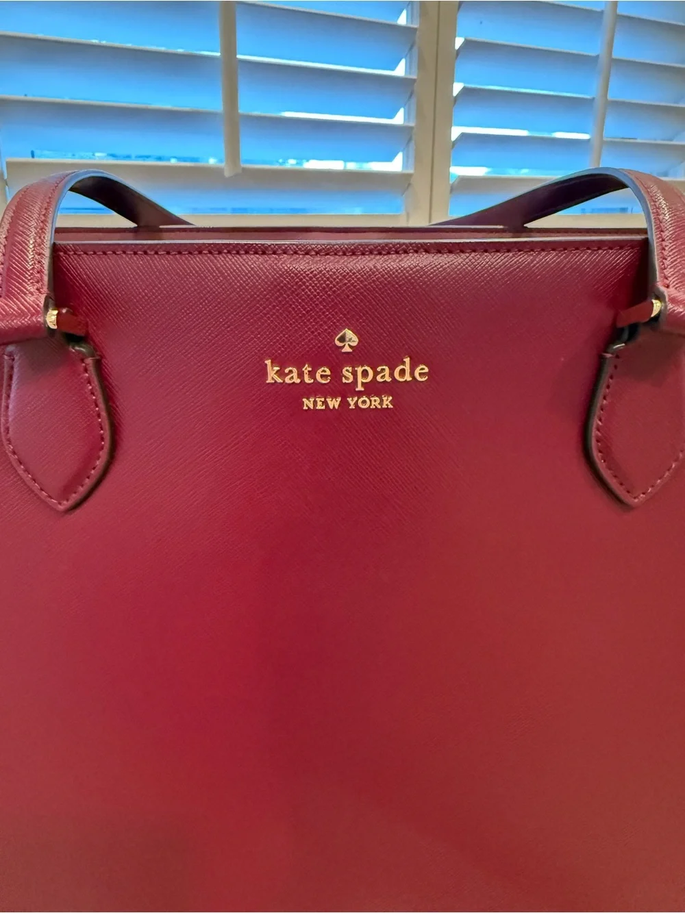 Kate Spade Madison Saffiano East-West Leather Laptop Tote in Burgundy